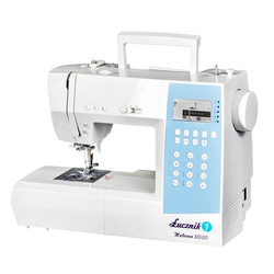 Helena 2060 sewing machine with carrying case, set of thread, needles, feet and bobbins