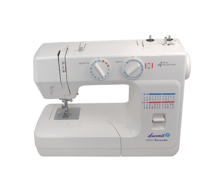 Kornelia II 2004 sewing machine with a set of feet