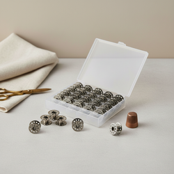 Kovové cívky pro šicí stroje (sada 25 ks v krabici)