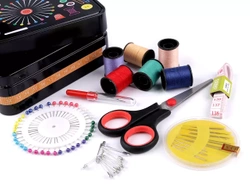 Sewing toolbox in a large metal can